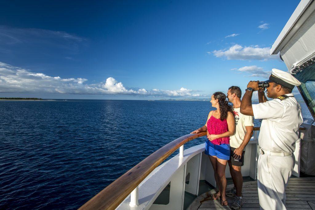 Officer Navigating Tivua - Captain Cook Cruises